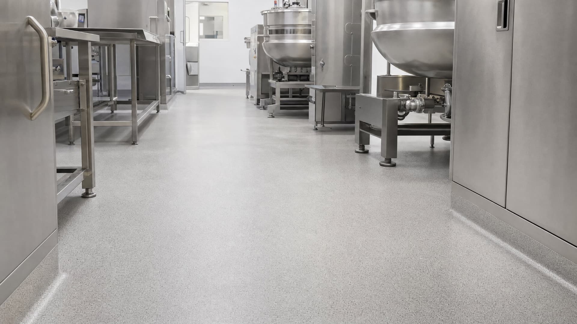Plancher industriel au quartz texturé réalisé par Nortex Époxy